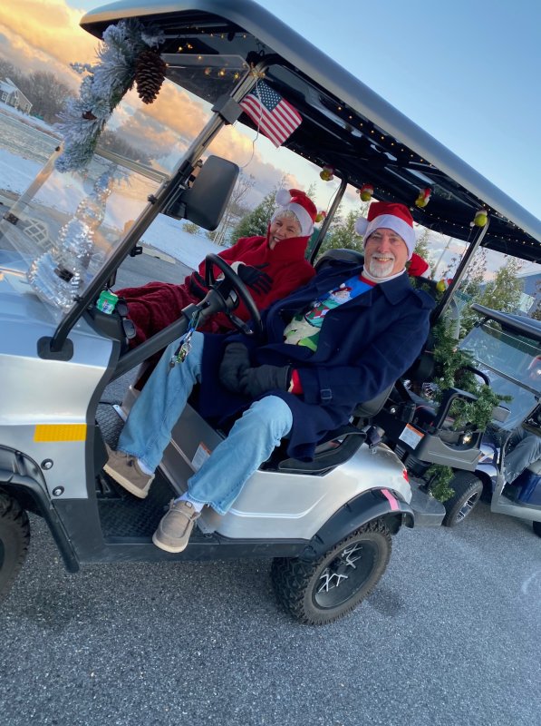 Showing off their holiday and community spirit are Melinda Shea, left, and Bill Shea, HOA board member.